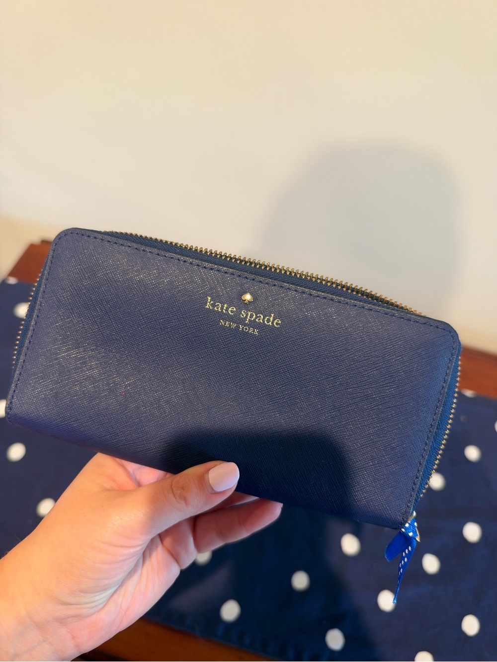 kate spade navy zip-around saffiano wallet with gold logo